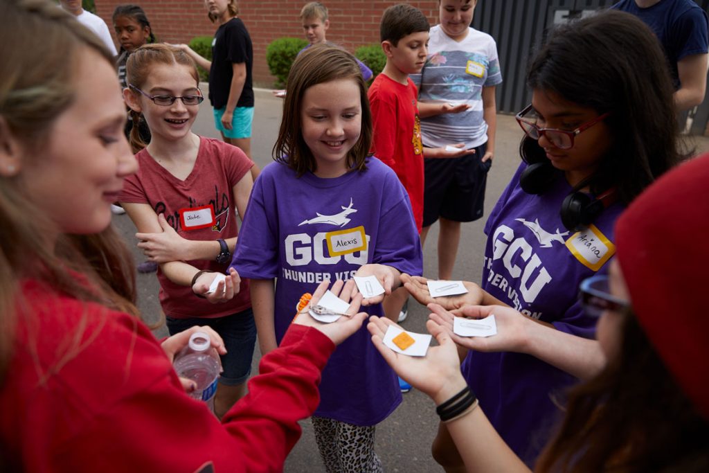 Students in group outside at STEM professional development event